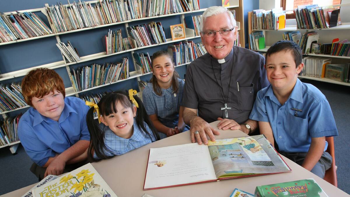 Bishop Ingham with St Francis Xaviers Public School students in 2008. 