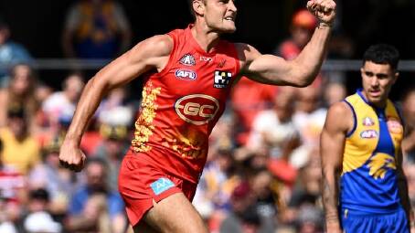 Jarrod Witts starred in Gold Coast's 37-point defeat of the Eagles. (Dave Hunt/AAP PHOTOS)